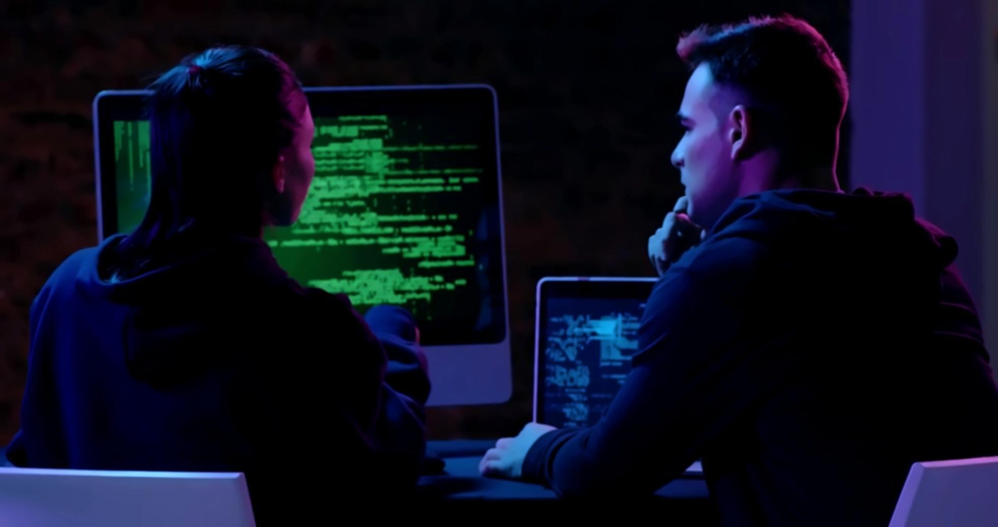 Engineers testing chatbot responses on multiple channels